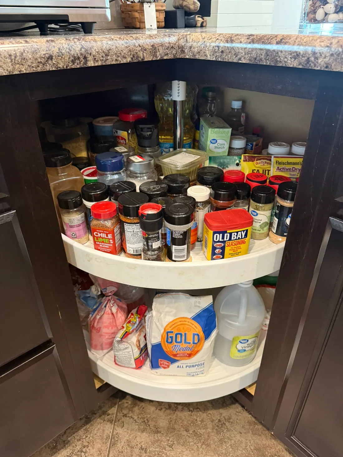 Detail of the actual spice cabinet with containers grouped